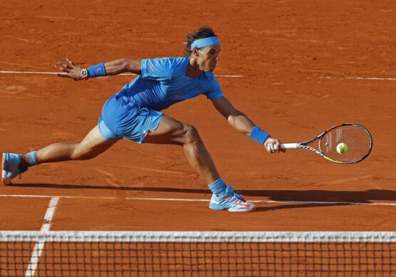 FILE -  Spain's Rafael Nadal plays a shot in the fourth round match of the French Open tennis tournament against Jack Sock of the U.S. to win in four sets 6-3, 6-1, 5-7, 6-2, at the Roland Garros stadium, in Paris, France, Monday, June 1, 2015. (AP Photo/Michel Euler, File)